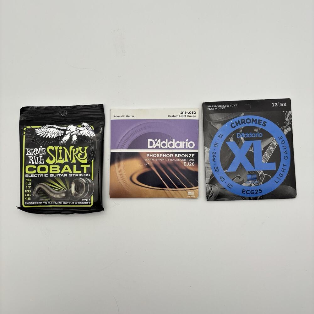 Assortment Of Ernie Ball And D’Addario Guitar Strings. Lot Of 3 Unopened Packs